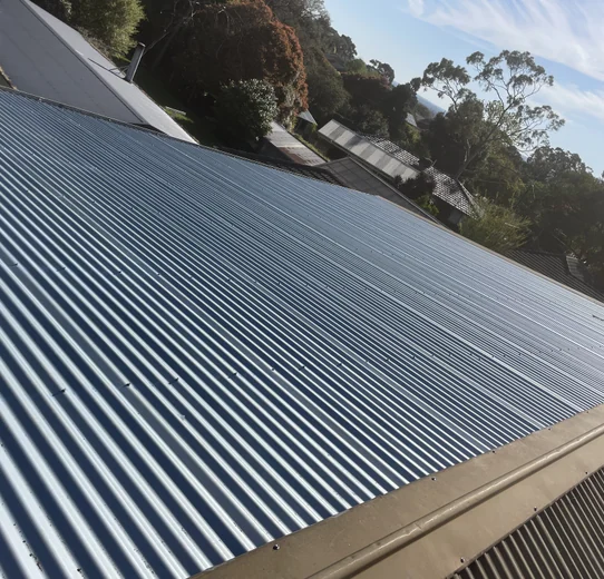 Corrugated Colorbond sheets fixed down on a Melbourne roof