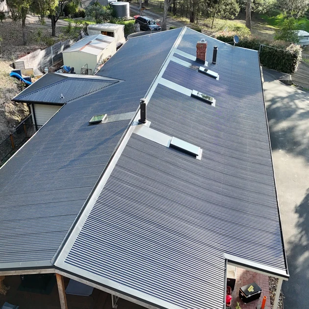 Completed metal roof replacement seen from above in Melbourne