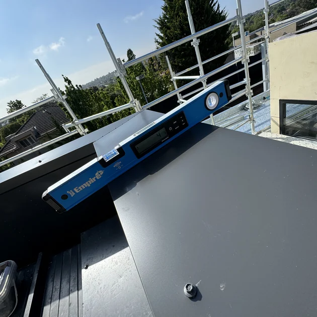 New valley and flashing metalwork set out on a Melbourne roof