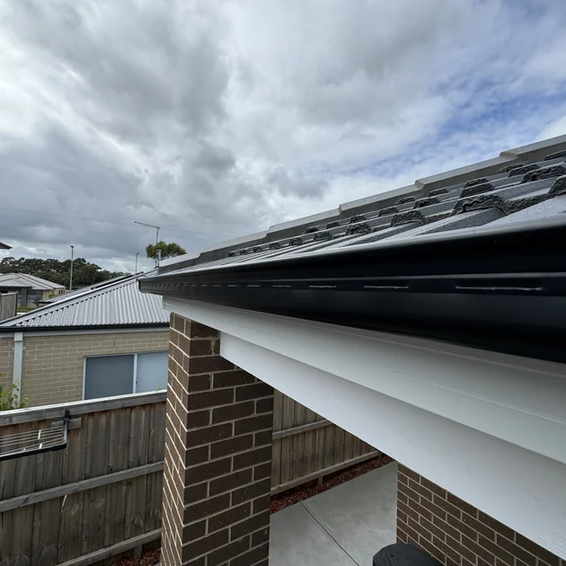 New Colorbond guttering and fascia fitted along a Melbourne roofline