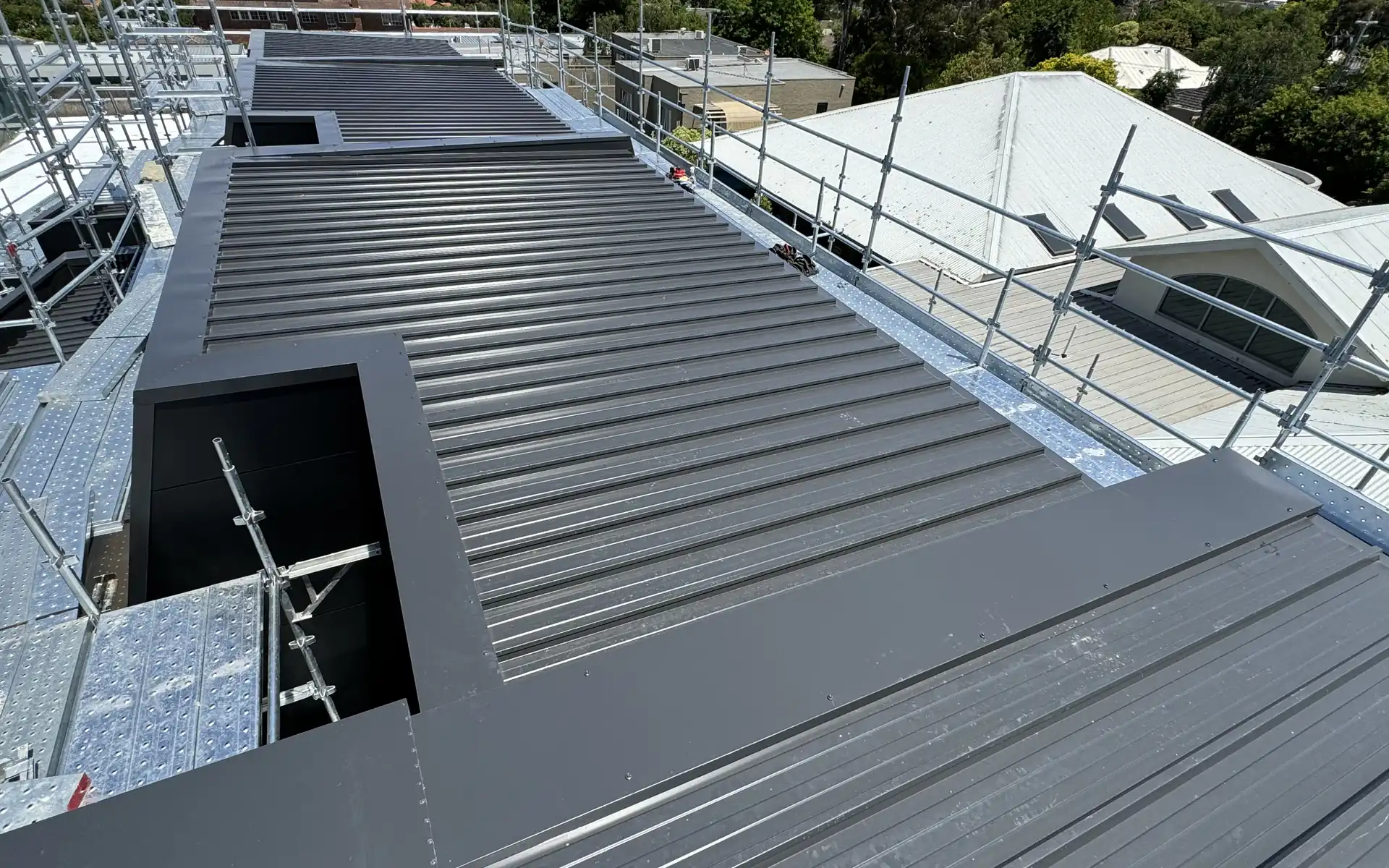 Roof replacement underway on a Melbourne property with scaffolding in place