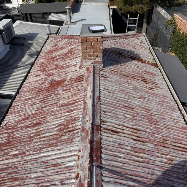 Corroded metal roof before replacement in Seaford